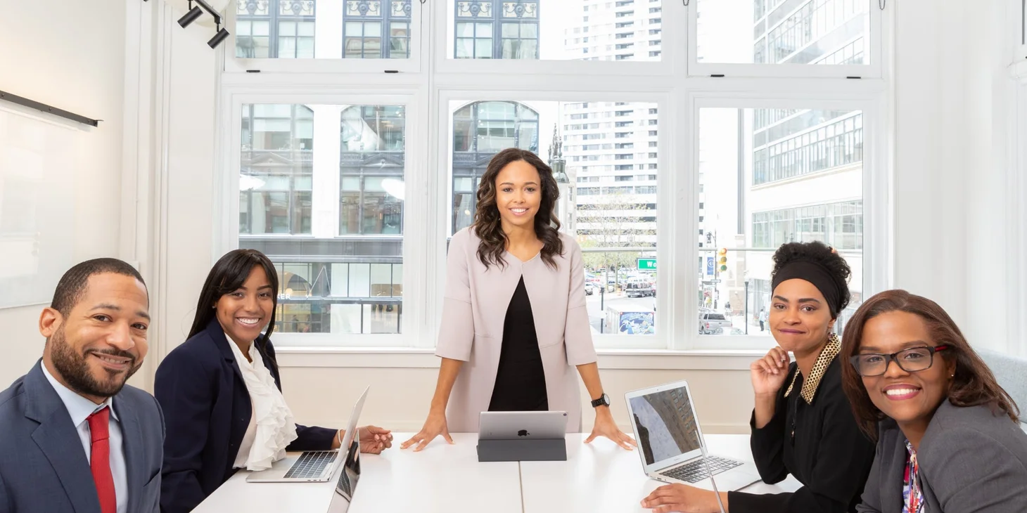 Smiling diverse business team in bright office